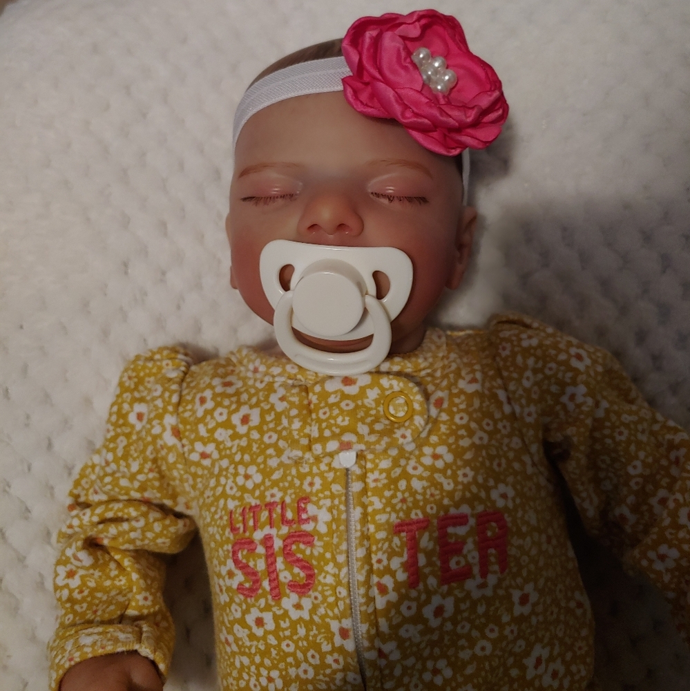Realistic bay doll